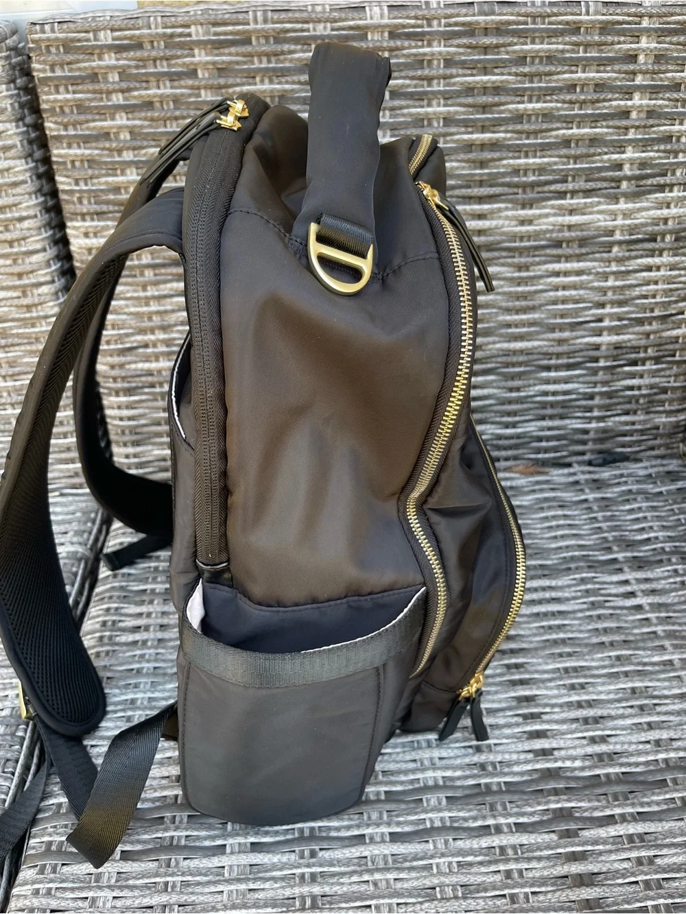 JuJuBe Black Backpack with Gold Hardware, and portable changing pad included